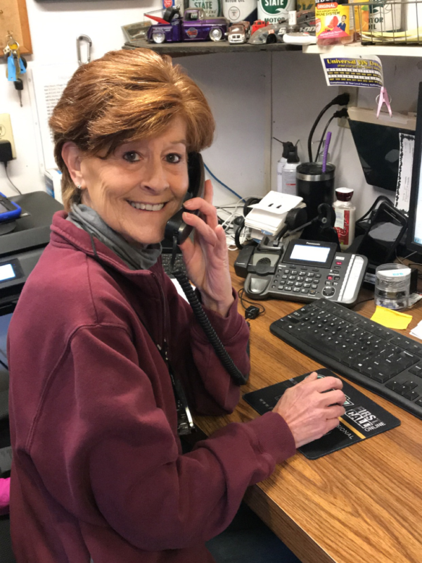 Kim Nieters, co-founder of Auto Savers, at the front desk