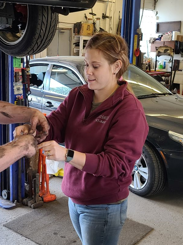 Megan Egan, operations at Auto Savers, working in the shop bay