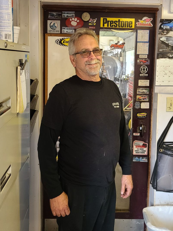 Tim Nieters, co-founder of Auto Savers, in the shop